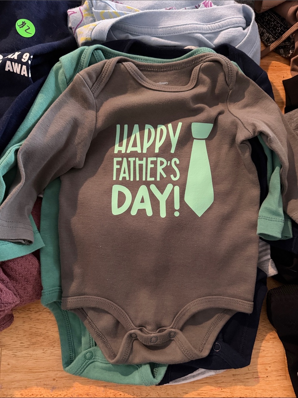 Primary Brown Baby One-Piece with Mint Green "Happy Father's Day" Print